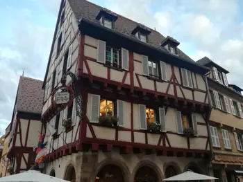 Folklore dancing in the evening at Colmar, Alsace (France)